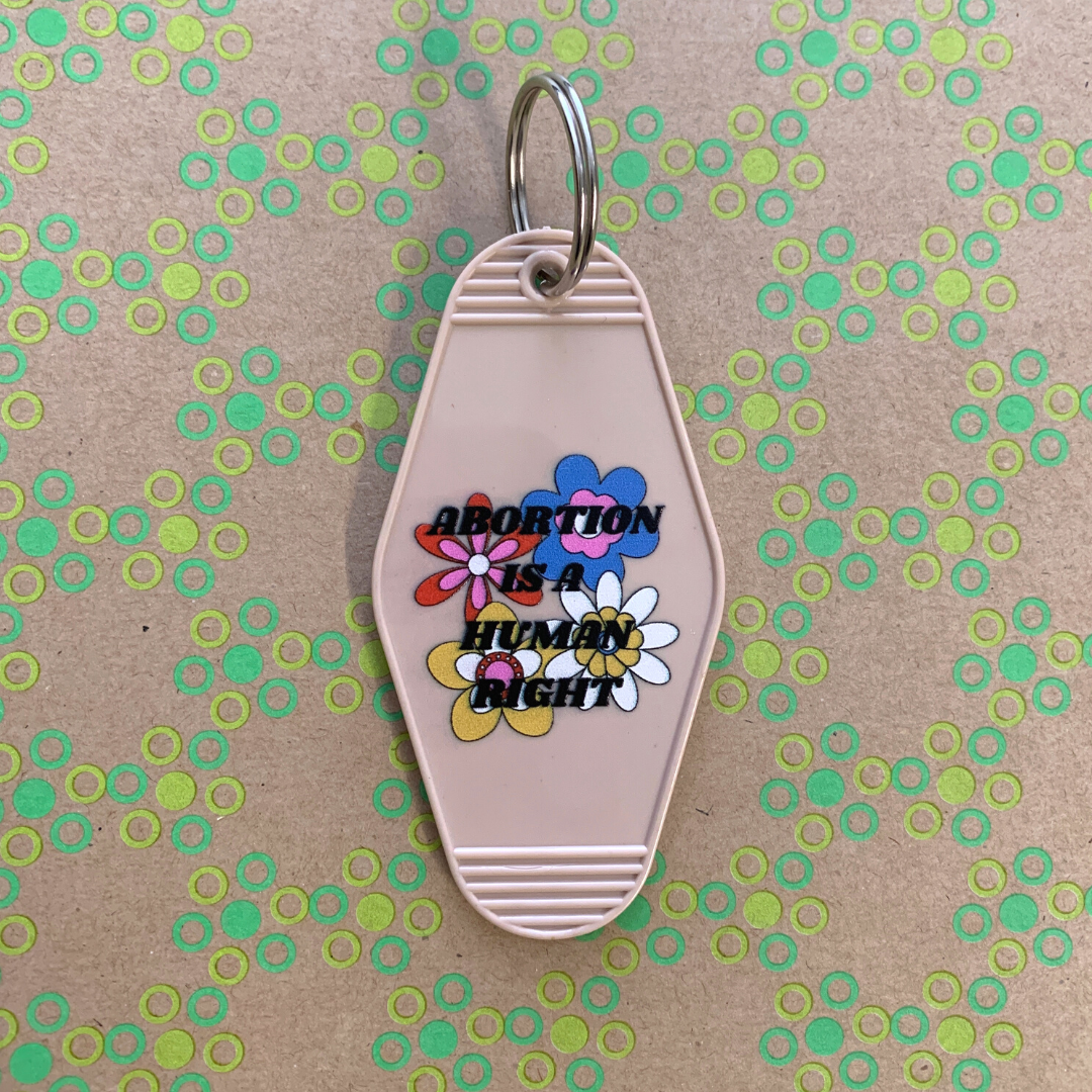 Abortion is a Human Right Keychain in Groovy '70s Flower Print