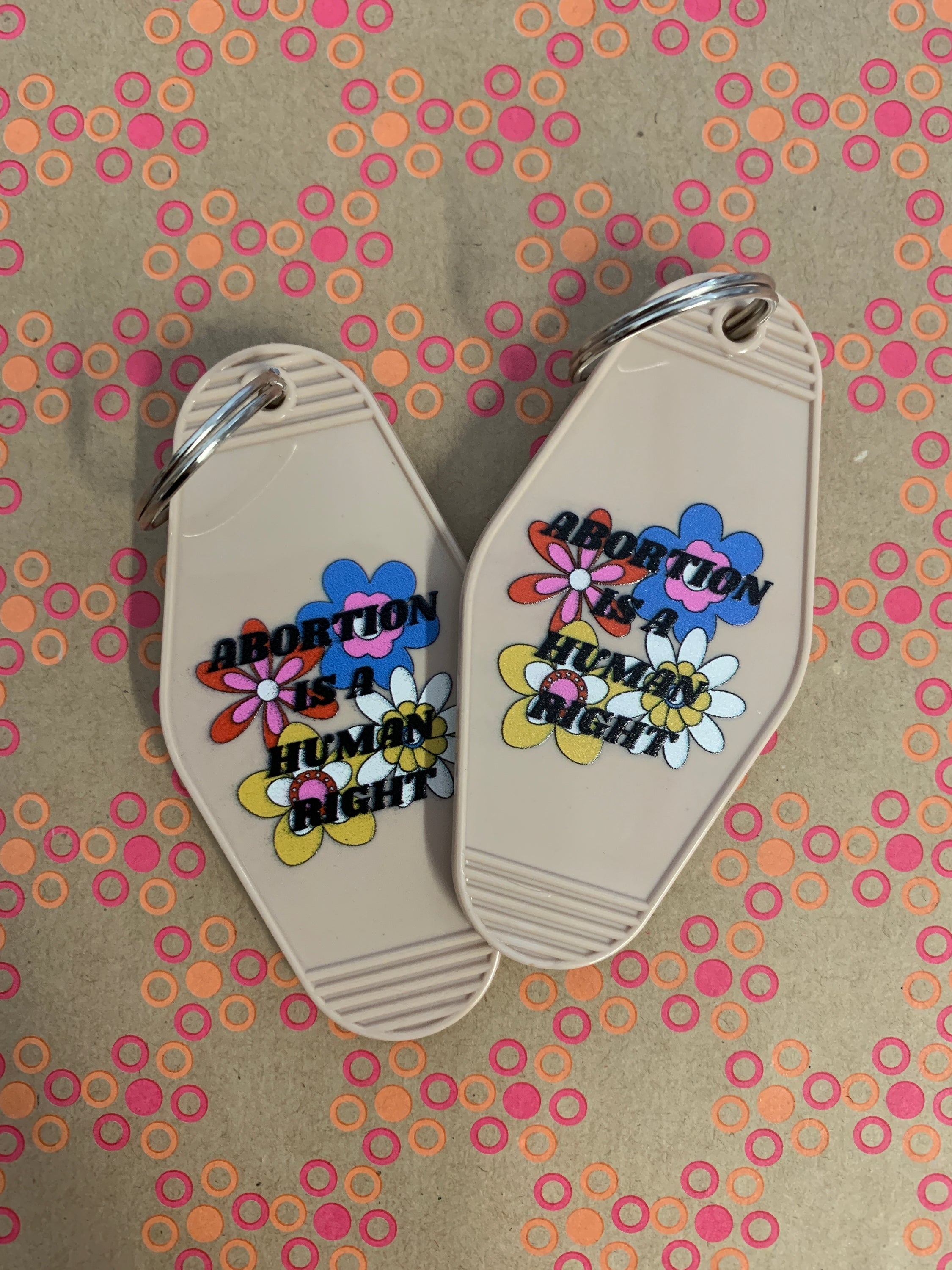 Abortion is a Human Right Keychain in Groovy '70s Flower Print